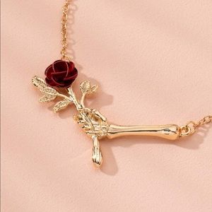 Skeleton rose necklace